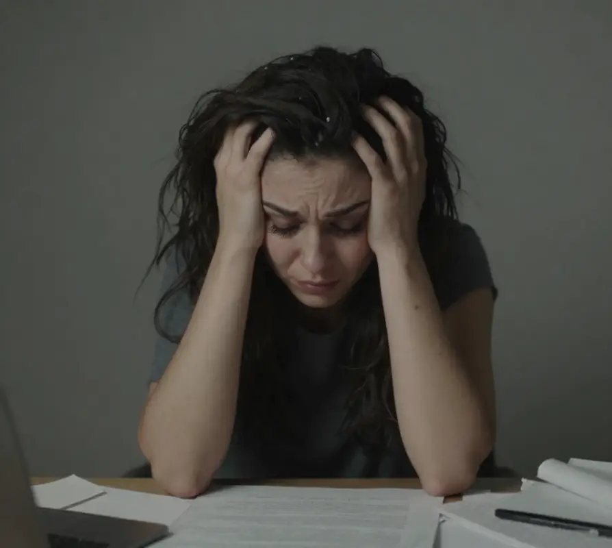 Illustration of a woman feeling mentally worn out and overwhelmed.