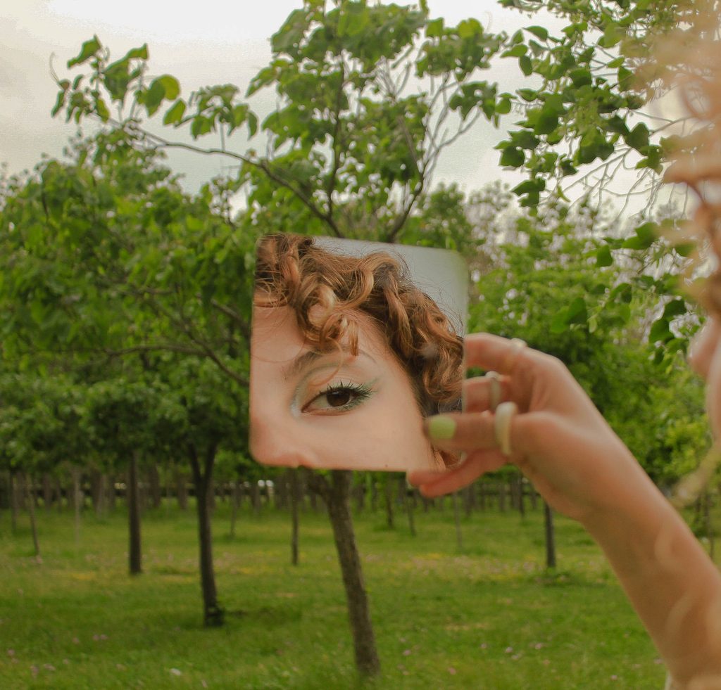 lady looking through the mirror. Deja vu episode